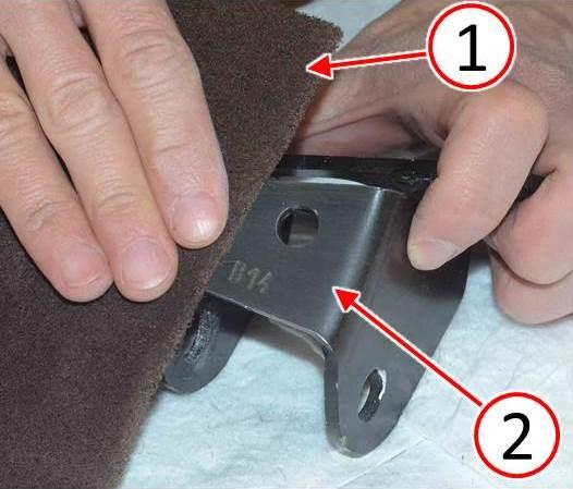 Fig. 6 Scuff Top Surface Of Shock Absorber Bracket With Abrasive Pad
