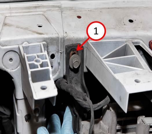 Fig. 9 Upper Radiator Support Bracket