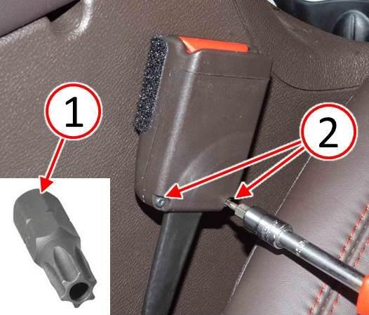 Fig. 2 Remove Seatbelt Buckle Cover Screws
