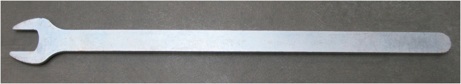 A special, thin (1.8mm) open-end 14mm wrench