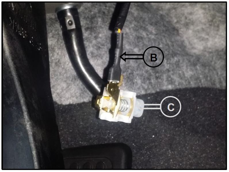 Disconnect the connector (B) and then remove the parking brake switch (C)