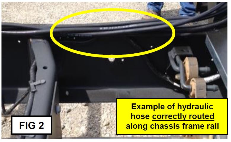 Example of hydraulic hose correctly routed along chassis frame rail