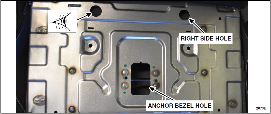 Shine a flashlight inside of the right side hole or the anchor bezel hole while viewing the two welds on the head rest bracket from the left side hole