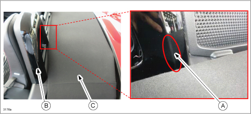Acratches (A) on the rear of the seat back bar garnish (B) from contact with the convertible top (C)