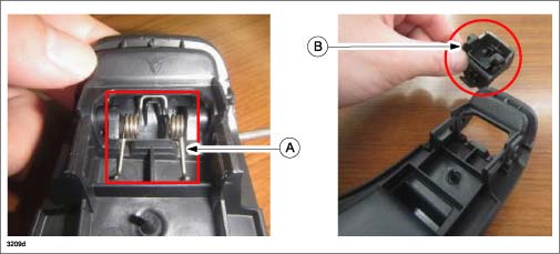 Remove the spring (A) and the console lid lock (B)