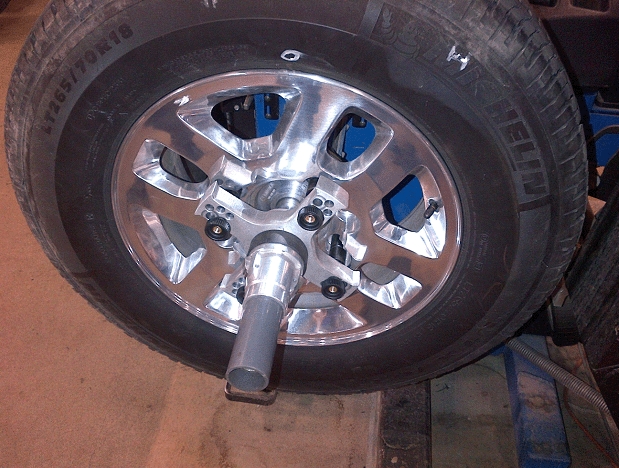 Four Arm Star Mounted to the Front of a Single Wheel Aluminum Rim
