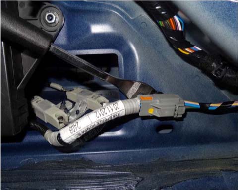 unfasten the connector retaining clip
