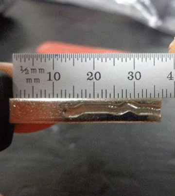 grinding or cutting 6-7mm (1/4 inch) off the tip of the key