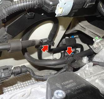 Secure the new engine line into the engine compartment clamps