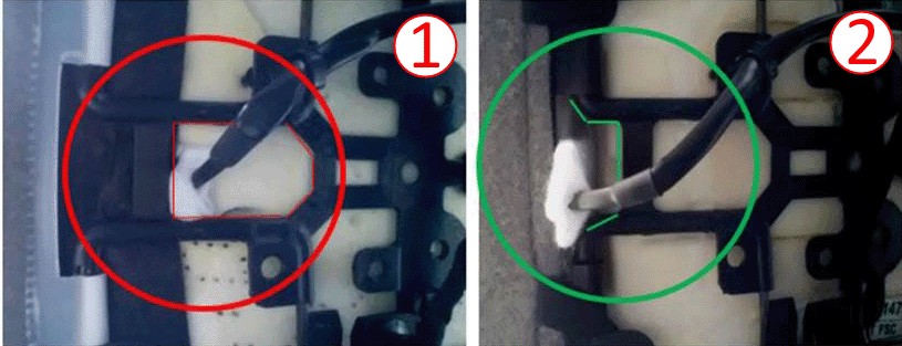 graphic depicts the incorrect pigtail harness route (1) and the correct pigtail harness route after repair (2).