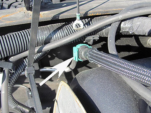 new transfer hose is made of rigid plastic (wrapped in a protective sleeve)
