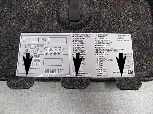 Align the lower edge of the label with the bottom of the cover