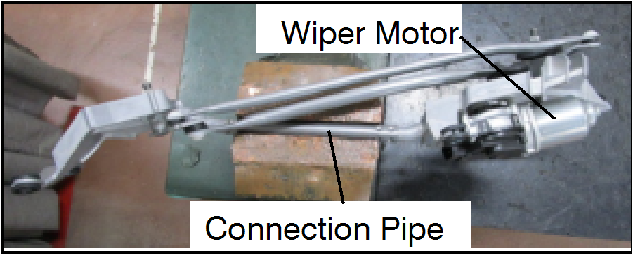 Rotate the wiper link assembly 90 degrees upward