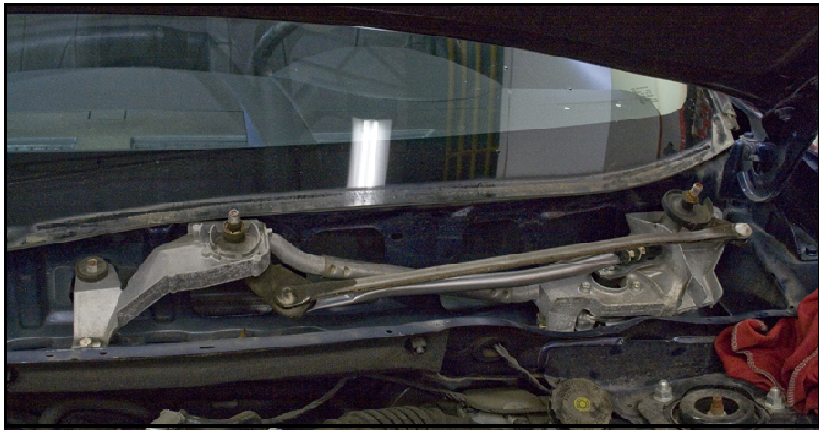 Reinstall the wiper link assembly to the vehicle