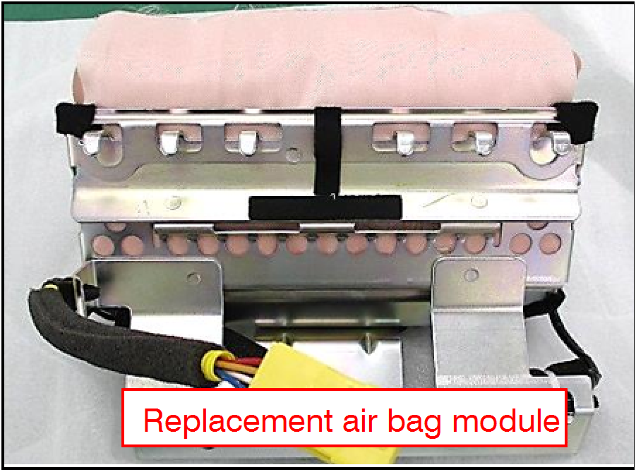 Verify that the replacement air bag inflator module appears intact