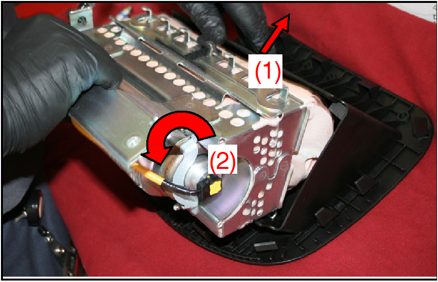 lightly pull the air bag module cover