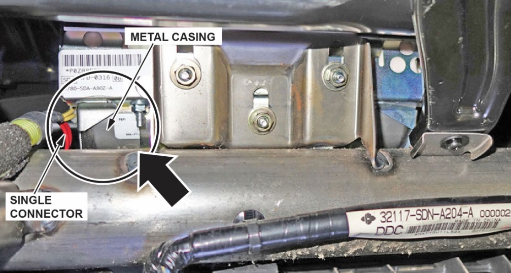 Takata inflators have a metal casing and there is only one electrical connector on the left side