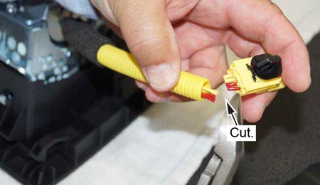 You must cut and short the wires as indicated to prevent accidental deployment
