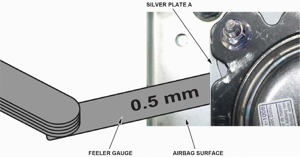 use a feeler gauge to make sure the space between silver plate A and the airbag module surface is no greater than 0.5 mm