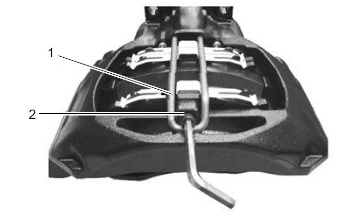 Removing the Brake Pad Hold-Down Bracket Screw