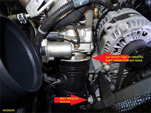 charged air cooler pipe at the intake air flow valve (throttle body)