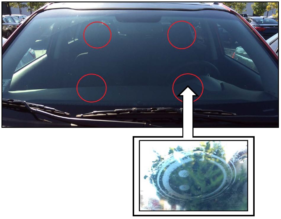 SUCTION CUP RESIDUE ON WINDSHIELD