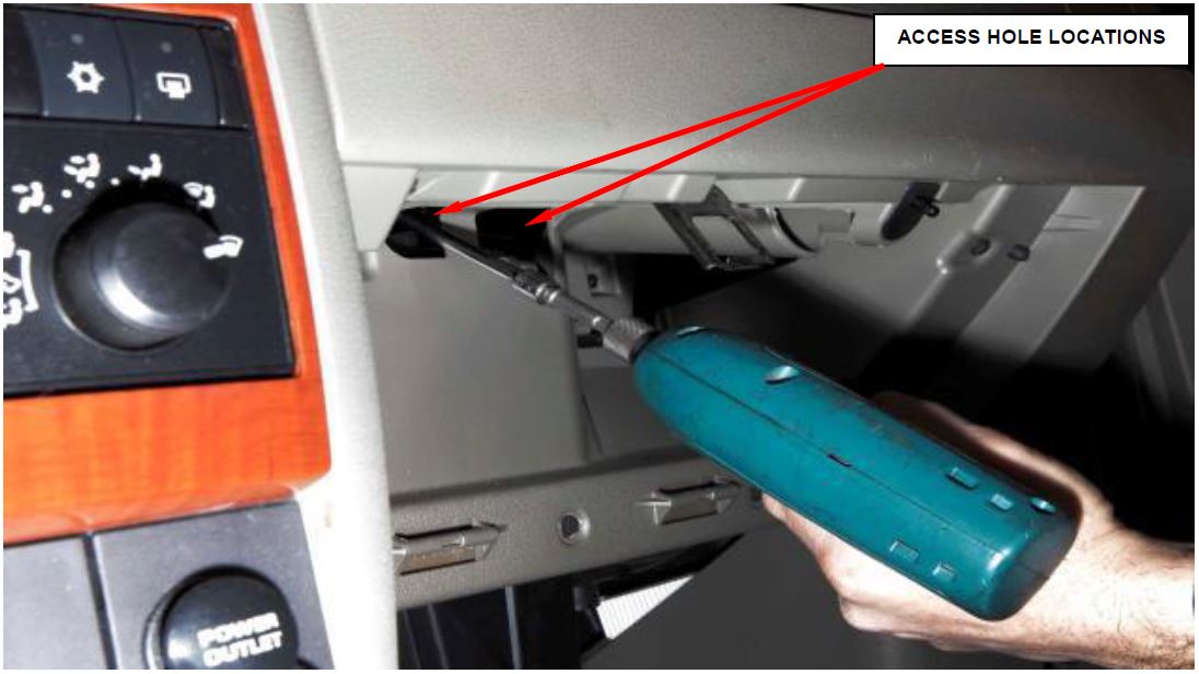 Figure 31 - Passenger Airbag Mounting Bolt Access Holes