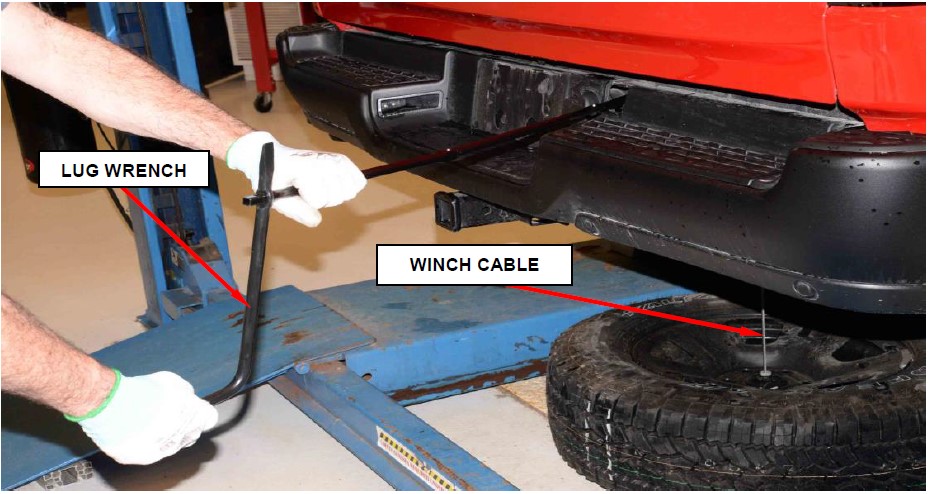 Figure 8 – Spare Tire Removal