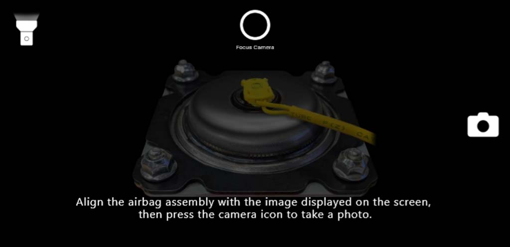 V-SMART will show you an example of how to line up the inflator to take the documentation photo. Select the Camera icon to take the photo