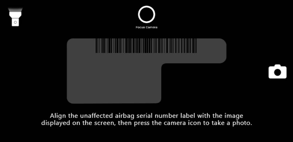 V-SMART will show an example of how to line up the label for the documentation photo. Select the Camera icon to take the photo
